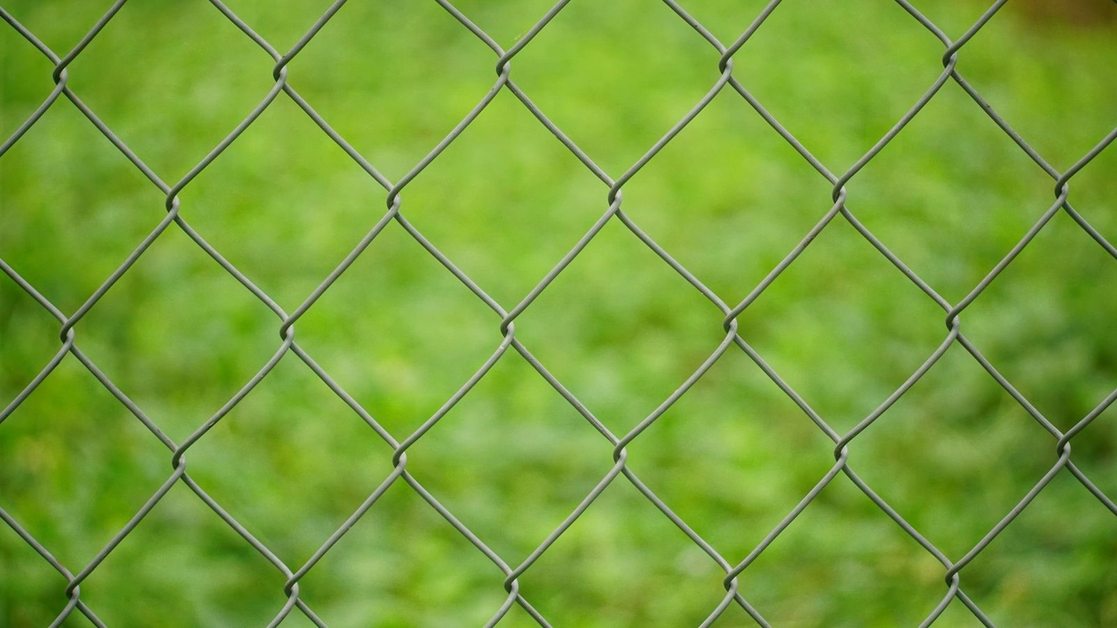 New chain link fence with diamond mesh pattern